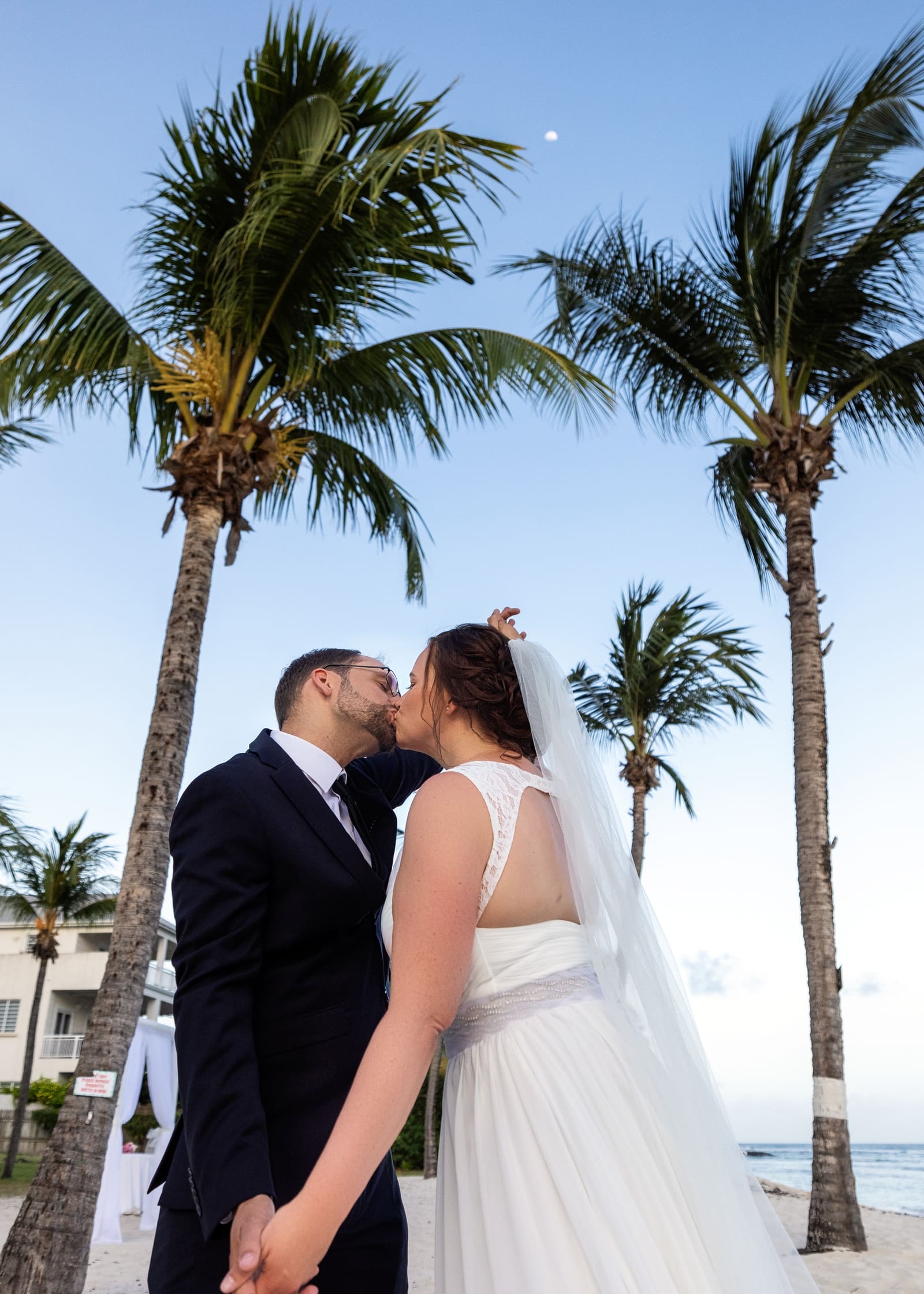 Wedding couple enjoy ideal beach location